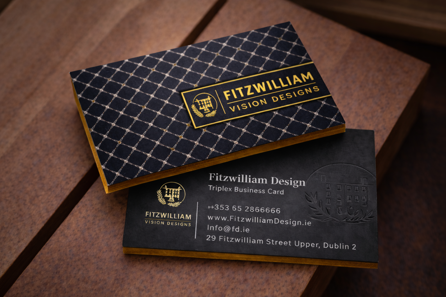 Luxury business cards in Ireland with a trellis pattern, gold foil logo and typography, gold edge gilding, and embossed reverse detailing.